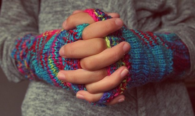 Fingerless gloves will keep your hands warm.