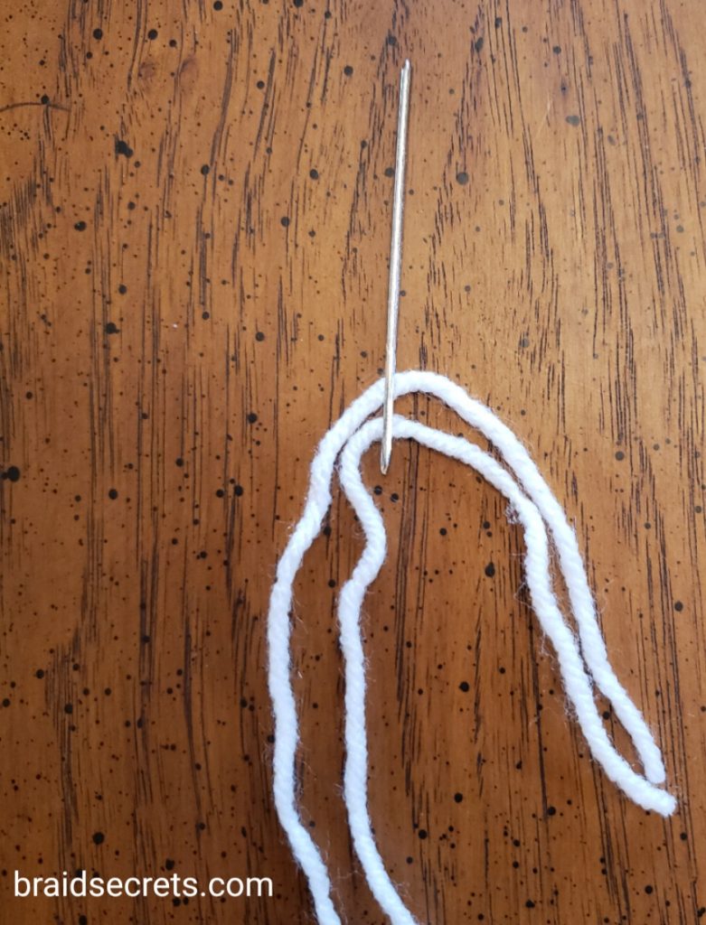 Horse Braiding Hacks: An embroidery needle for pulling up the braids.