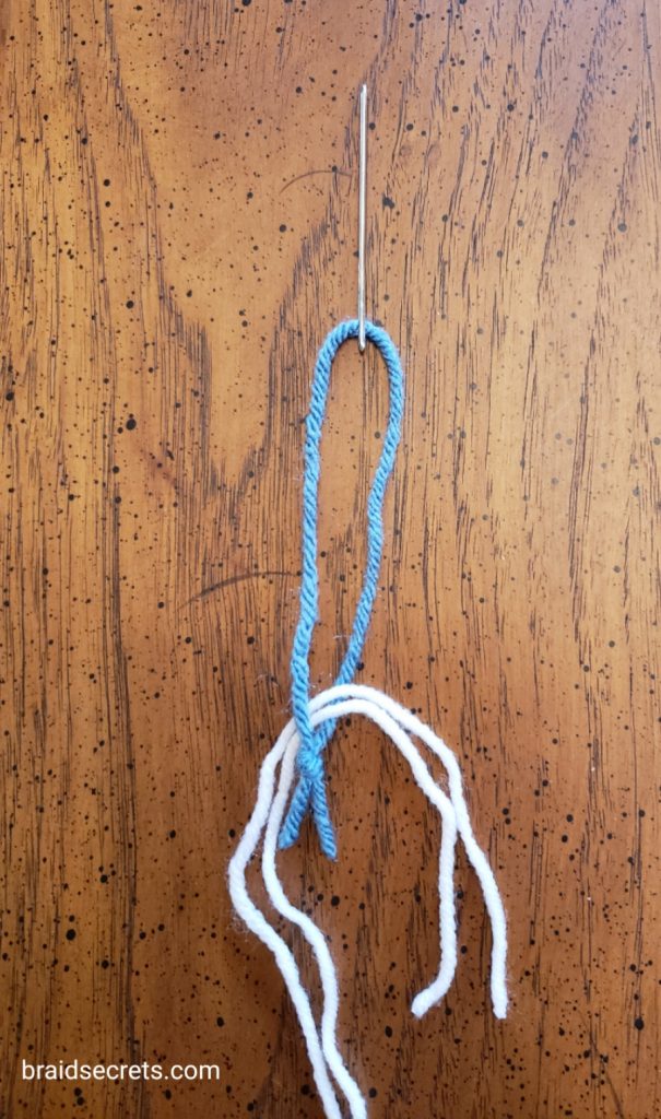 Horse Braiding Hacks: Use an embroidery needle with a yarn loop to pull up braids.